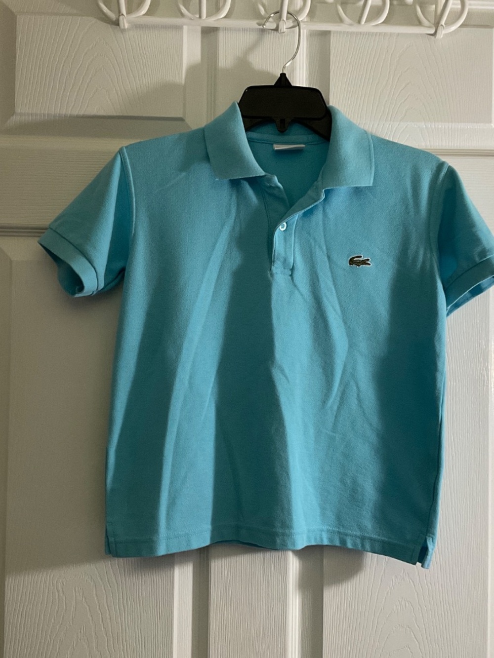 Lacoste polo shirt size 14 children